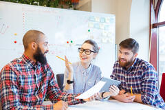 multiethnic_group_of_happy_business_people_working_together_in_office