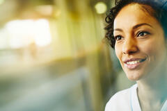 A woman smiling