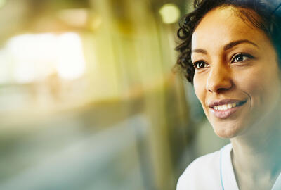 A woman smiling